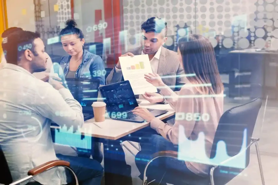 Business team discussing riproar business digital transformation strategy in a modern office setting.