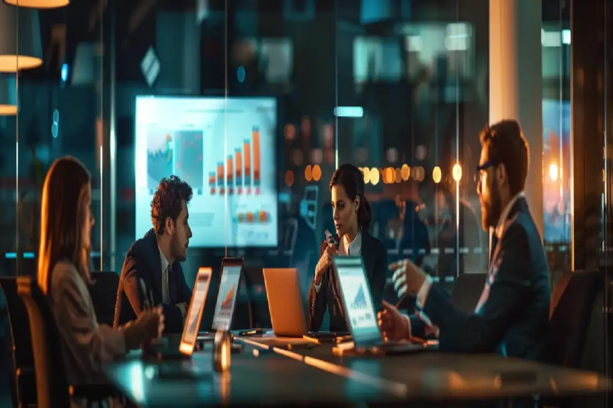 Professionals analyze real-time business charts and graphs, showcasing the advantages of top enterprise search software in supporting informed organizational decisions.